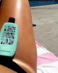 Accélérateur RAPID ELIXIR sur fond de plage ensoleillée.