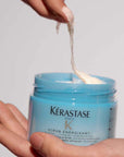 Fusio Scrub exfoliant énergisant pour cuir chevelu à texture crémeuse et purifiante.