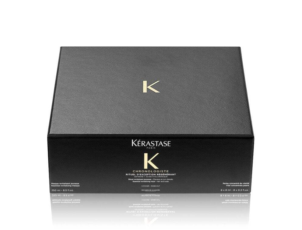Luxurious RITUEL D'EXCEPTION RÉGÉNÉRANT hair care product in sleek black packaging.